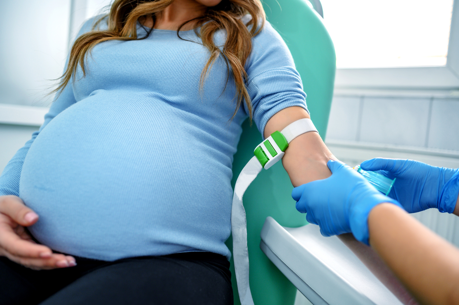 Pregnant woman having a blood test